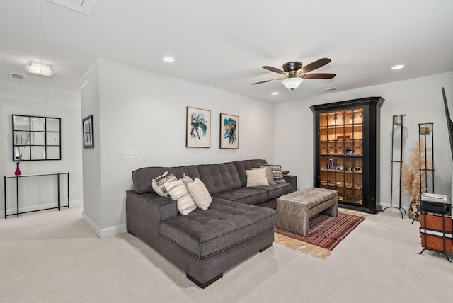 carpeted living area featuring attic access, recessed lighting, and visible vents