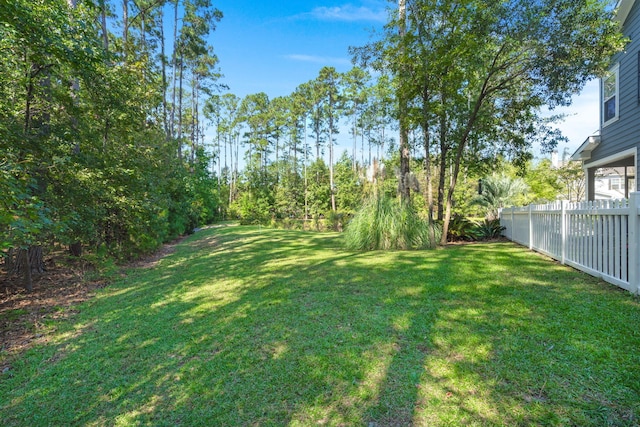 view of yard with fence