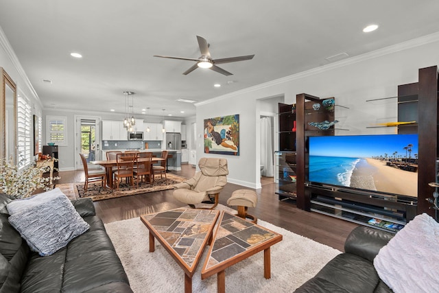 living room featuring recessed lighting, wood finished floors, a ceiling fan, and crown molding