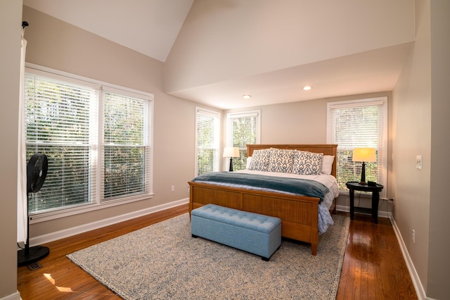 bedroom featuring lofted ceiling, dark wood-type flooring, recessed lighting, and baseboards