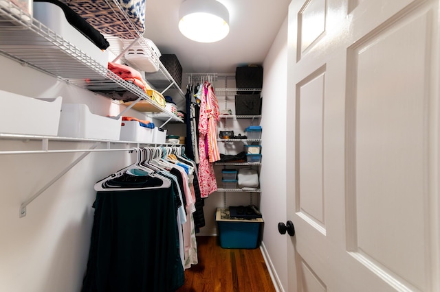 spacious closet with wood finished floors