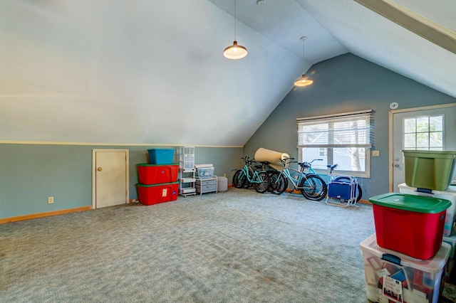 additional living space featuring carpet floors, lofted ceiling, and baseboards