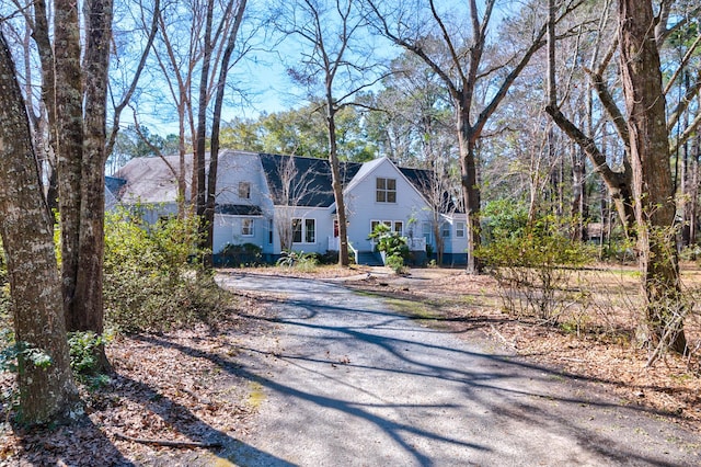 cape cod house with driveway