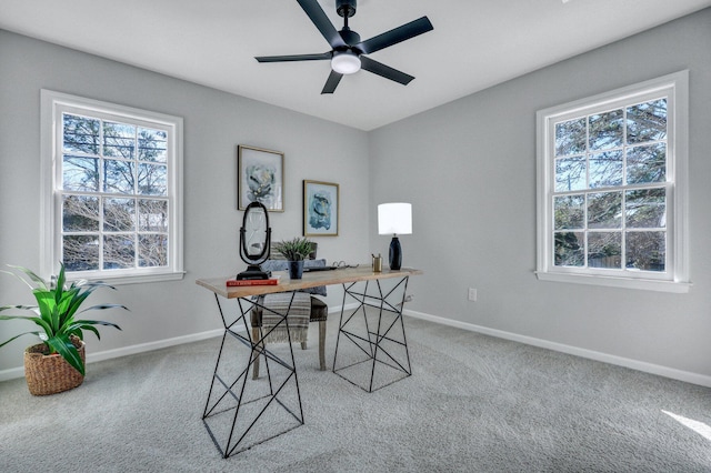 carpeted office with ceiling fan