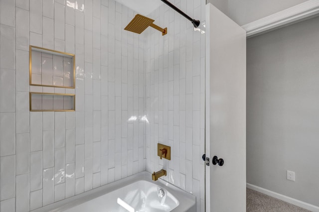 bathroom featuring tiled shower / bath combo