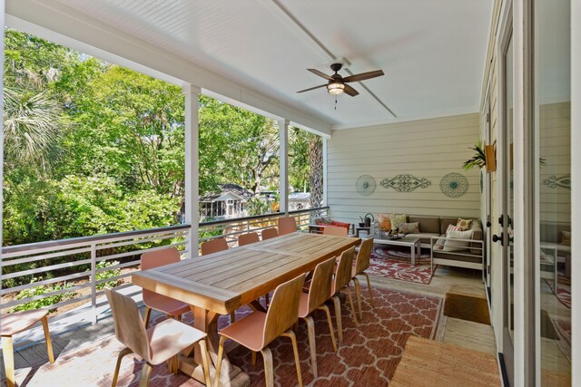 sunroom / solarium with ceiling fan