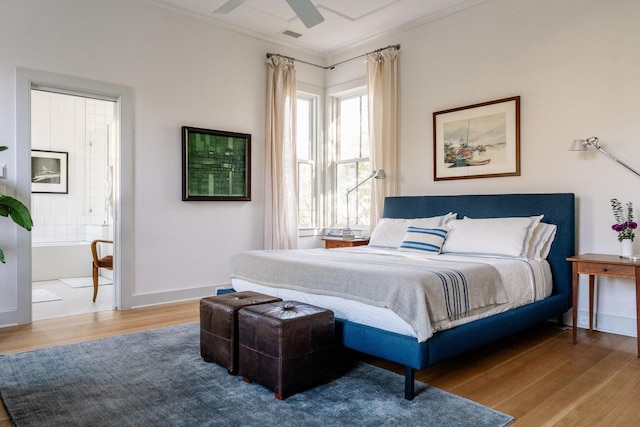 222 Haddrell St, Mount Pleasant, SC 29464 - bedroom with wood finished floors, ornamental molding, connected bathroom, and a ceiling fan