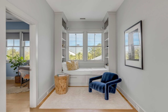 222 Haddrell St, Mount Pleasant, SC 29464 - sitting room featuring wood finished floors and baseboards
