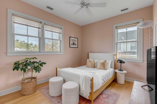 222 Haddrell St, Mount Pleasant, SC 29464 - bedroom with wood finished floors, baseboards, and a ceiling fan