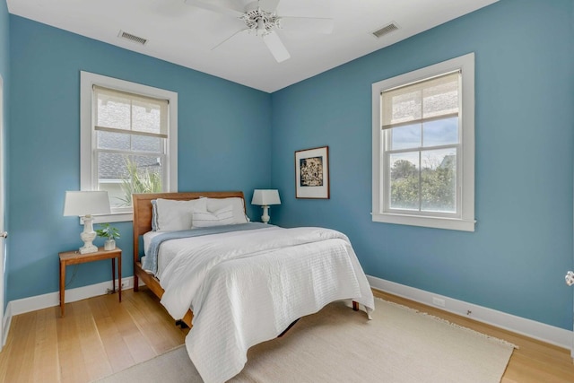 222 Haddrell St, Mount Pleasant, SC 29464 - bedroom with wood finished floors, baseboards, and ceiling fan