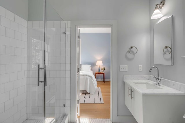 222 Haddrell St, Mount Pleasant, SC 29464 - full bath featuring a stall shower, vanity, wood finished floors, and connected bathroom