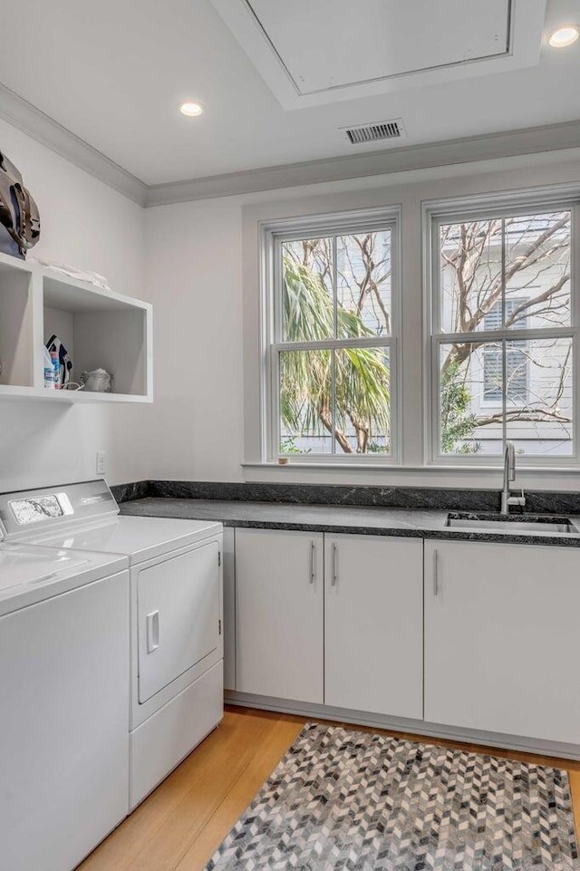 222 Haddrell St, Mount Pleasant, SC 29464 - laundry room featuring a sink, washing machine and clothes dryer, light wood-type flooring, recessed lighting, and attic access