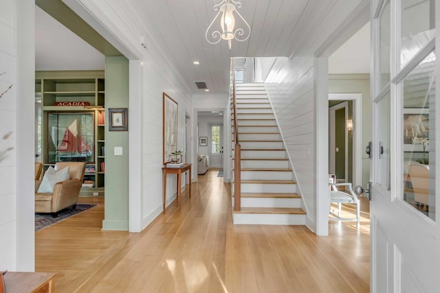 222 Haddrell St, Mount Pleasant, SC 29464 - foyer entrance featuring stairway, light wood-style flooring, ornamental molding, and baseboards
