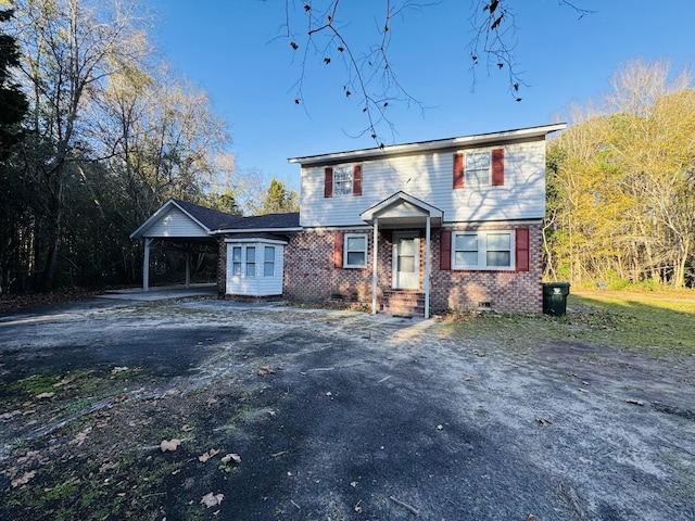 view of front of house featuring a carport