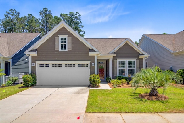 5078 Song Sparrow Way, Summerville, SC 29483 - craftsman-style home featuring driveway, a front lawn, and roof with shingles