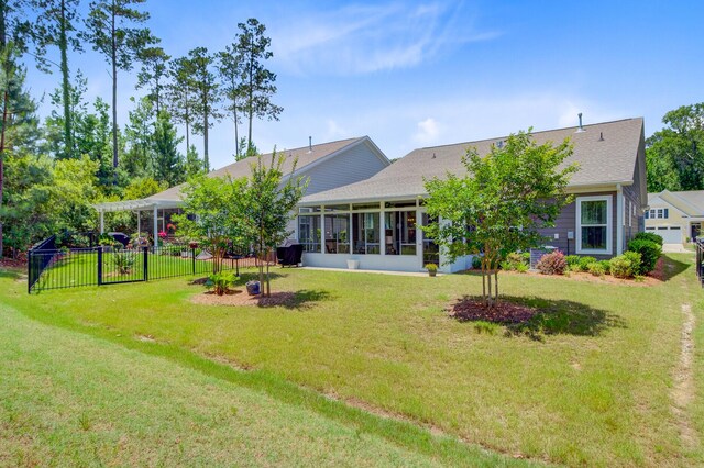 5078 Song Sparrow Way, Summerville, SC 29483 - back of property featuring a sunroom, roof with shingles, and a pergola