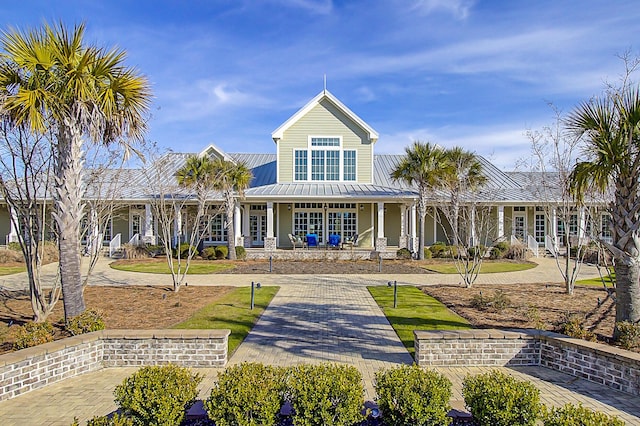 5078 Song Sparrow Way, Summerville, SC 29483 - rear view of house featuring a porch, metal roof, and a standing seam roof