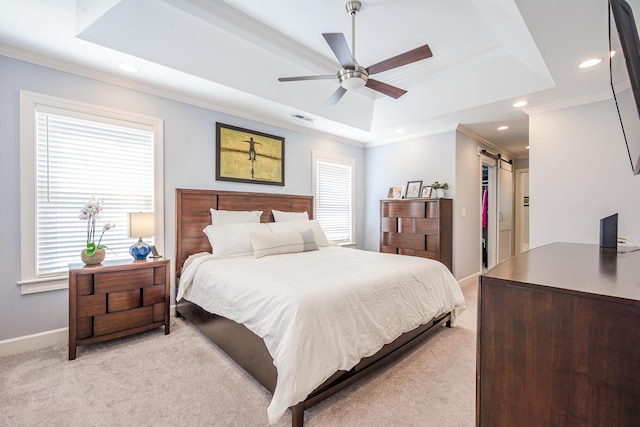 bedroom with baseboards, a raised ceiling, crown molding, and light colored carpet