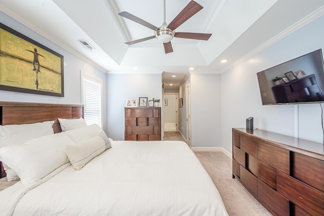 bedroom featuring baseboards, ornamental molding, recessed lighting, a raised ceiling, and light carpet