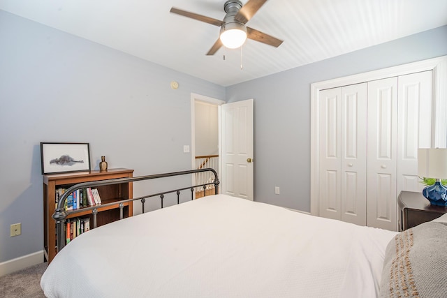 bedroom featuring baseboards, a closet, carpet, and a ceiling fan