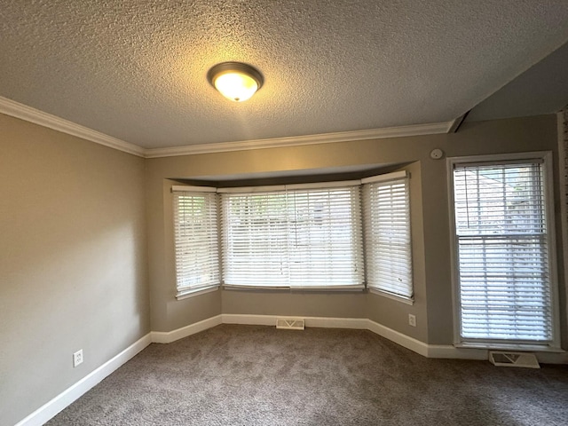 106 Pelican St, Ladson, SC 29456 - empty room featuring dark carpet, crown molding, visible vents, and a textured ceiling
