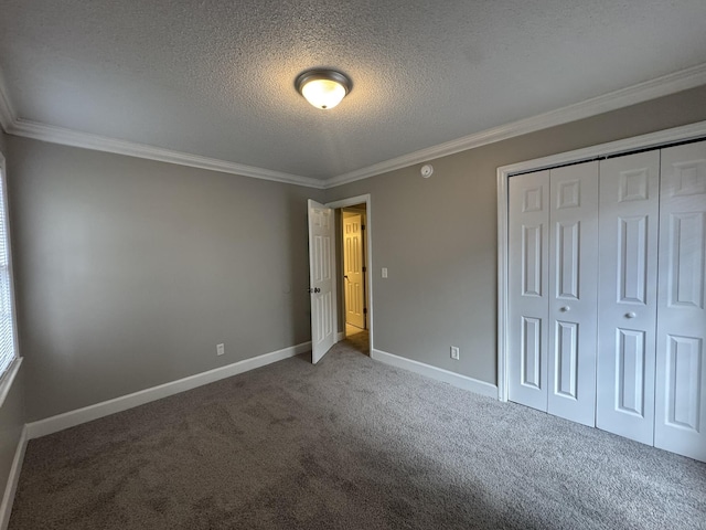 106 Pelican St, Ladson, SC 29456 - unfurnished bedroom featuring a closet, a textured ceiling, crown molding, carpet floors, and baseboards