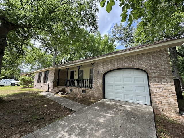 106 Pelican St, Ladson, SC 29456 - ranch-style home with covered porch, brick siding, crawl space, driveway, and a garage
