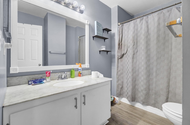 4662 Nibbs Ln, North Charleston, SC 29418 - bathroom featuring vanity, toilet, wood finished floors, and a shower with curtain