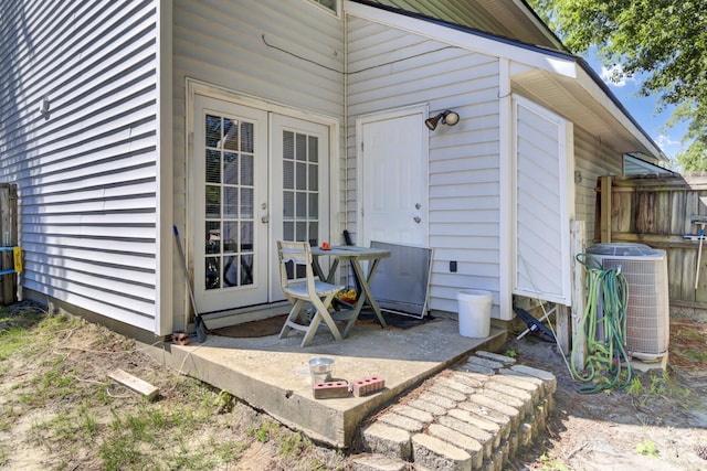 4662 Nibbs Ln, North Charleston, SC 29418 - view of exterior entry featuring french doors and cooling unit