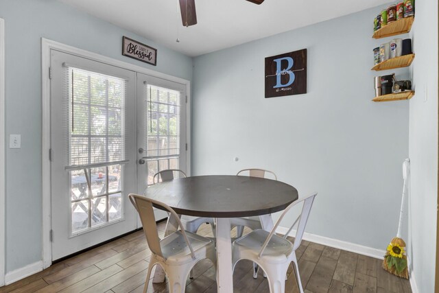 4662 Nibbs Ln, North Charleston, SC 29418 - dining area featuring wood finished floors, a ceiling fan, baseboards, and french doors