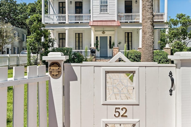 view of front facade with a balcony