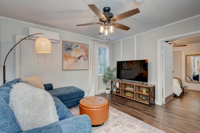 living room featuring ornamental molding, a wall unit AC, dark hardwood / wood-style floors, and ceiling fan