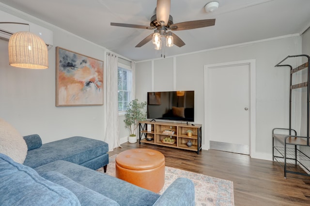 living room featuring ornamental molding, hardwood / wood-style floors, and ceiling fan