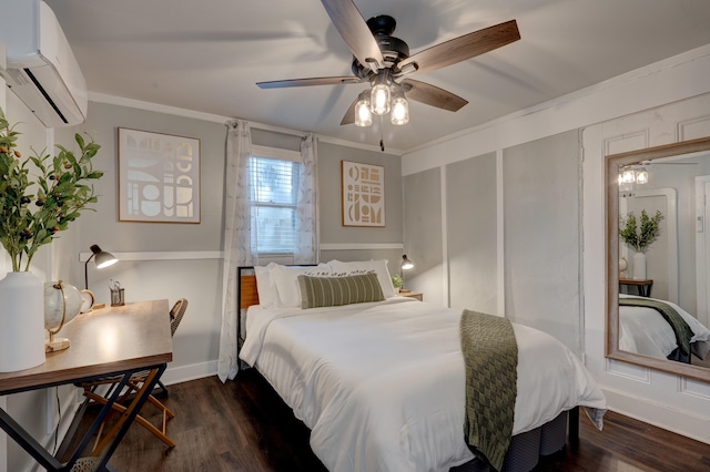 bedroom featuring dark wood-type flooring, a wall unit AC, ceiling fan, and crown molding