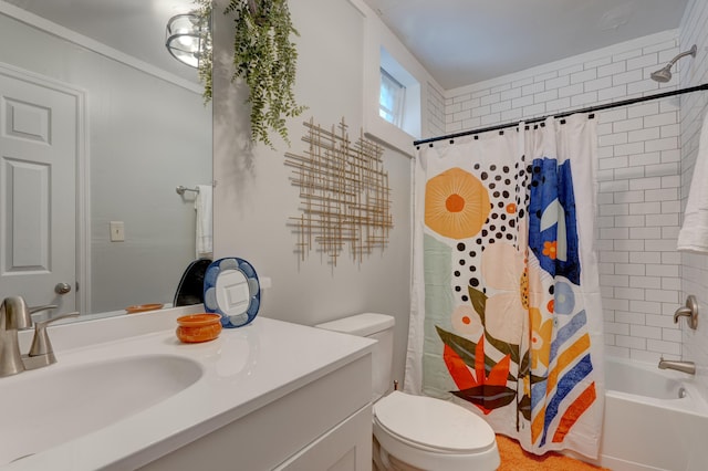 full bathroom with shower / bath combo with shower curtain, vanity, and toilet