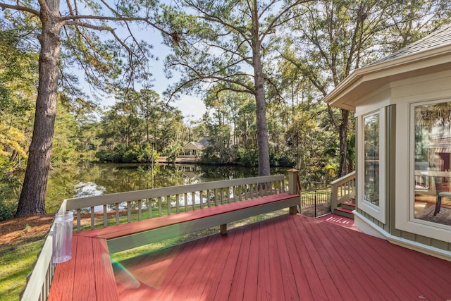 2105 Loblolly Ln, Seabrook Island, SC 29455 - wooden terrace with a water view and view of scattered trees