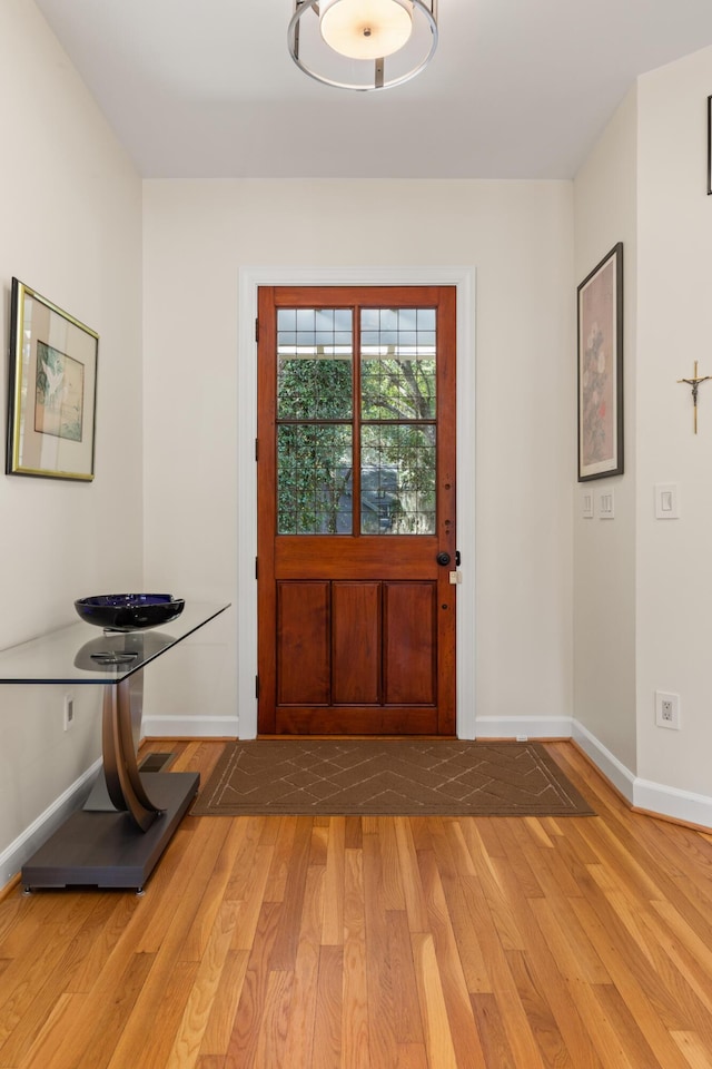2105 Loblolly Ln, Seabrook Island, SC 29455 - foyer entrance with light wood finished floors and baseboards