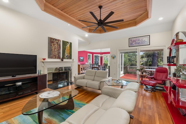 2105 Loblolly Ln, Seabrook Island, SC 29455 - living area with a raised ceiling, wooden ceiling, ceiling fan, recessed lighting, and hardwood / wood-style flooring