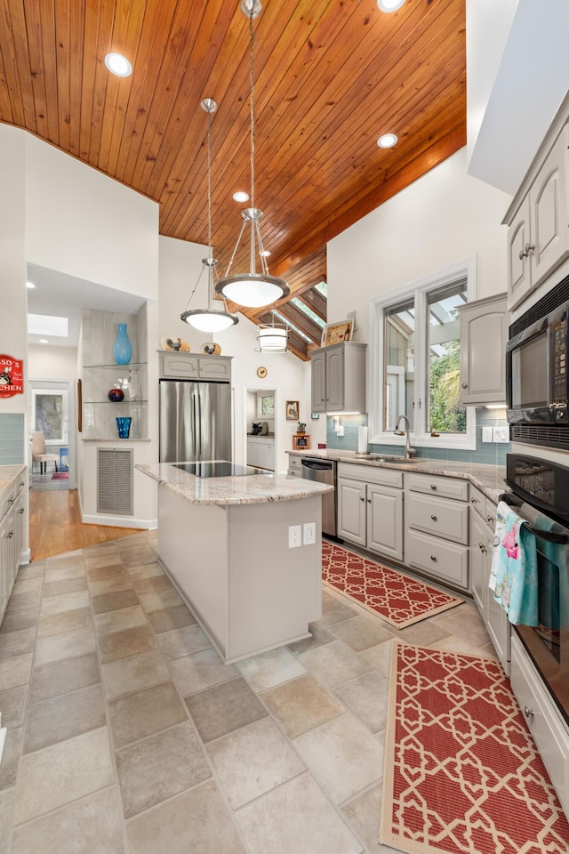 2105 Loblolly Ln, Seabrook Island, SC 29455 - kitchen featuring black appliances, a kitchen island, wooden ceiling, a sink, and gray cabinets