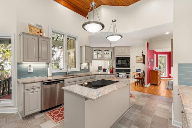 2105 Loblolly Ln, Seabrook Island, SC 29455 - kitchen featuring black appliances, wood ceiling, a sink, high vaulted ceiling, and a center island