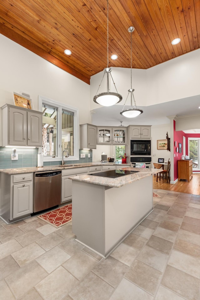 2105 Loblolly Ln, Seabrook Island, SC 29455 - kitchen with appliances with stainless steel finishes, a high ceiling, a kitchen island, gray cabinetry, and wood ceiling