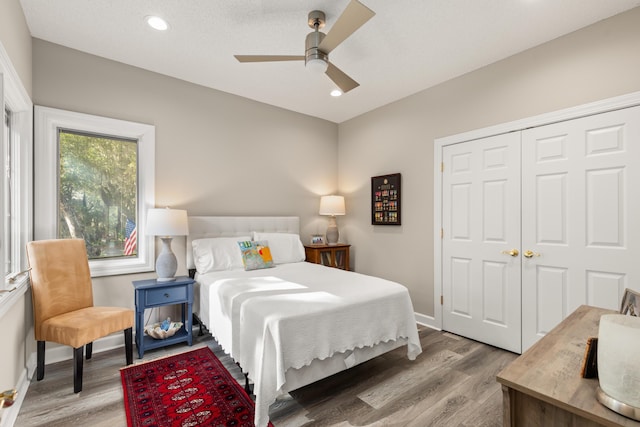 2105 Loblolly Ln, Seabrook Island, SC 29455 - bedroom featuring light wood-type flooring, baseboards, recessed lighting, ceiling fan, and a closet