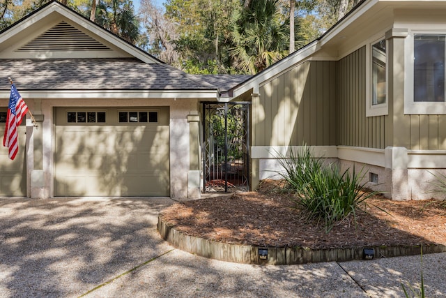 2105 Loblolly Ln, Seabrook Island, SC 29455 - view of front of home with crawl space, an attached garage, concrete driveway, and a shingled roof