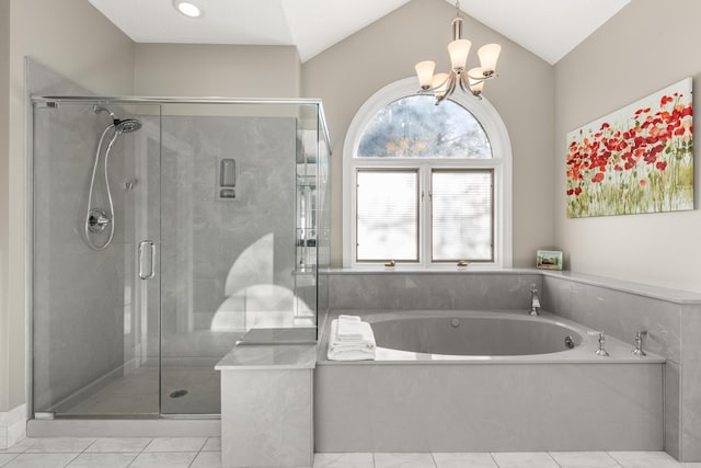 2105 Loblolly Ln, Seabrook Island, SC 29455 - full bathroom with a chandelier, a garden tub, a stall shower, vaulted ceiling, and tile patterned flooring
