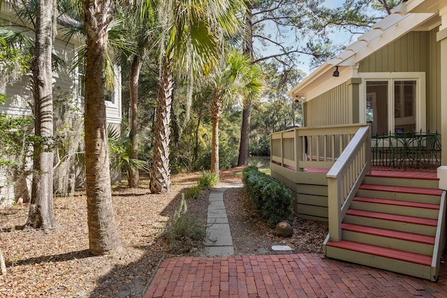 2105 Loblolly Ln, Seabrook Island, SC 29455 - view of yard with a wooden deck and stairs