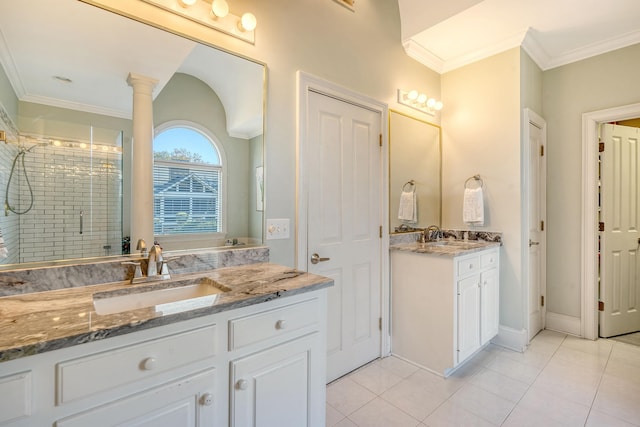 bathroom featuring tile patterned floors, ornamental molding, walk in shower, and decorative columns