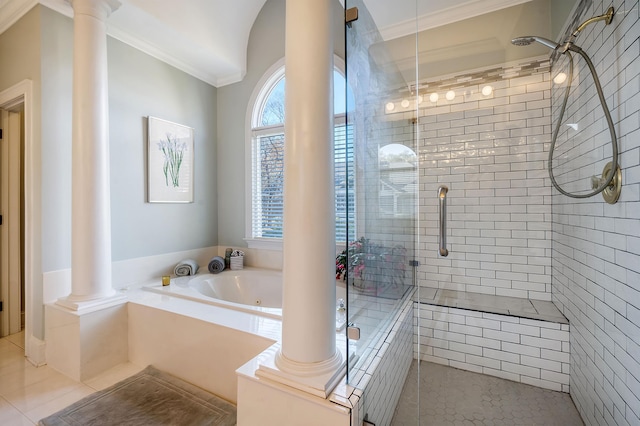 bathroom featuring tile patterned floors, crown molding, decorative columns, and shower with separate bathtub