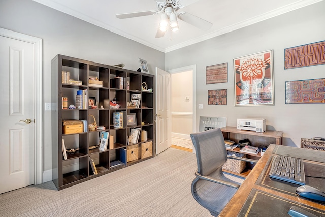 office featuring ceiling fan, light colored carpet, and ornamental molding