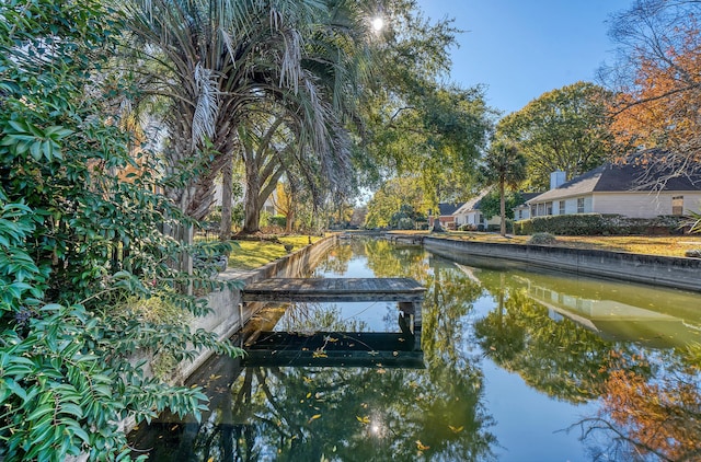 view of dock with a water view