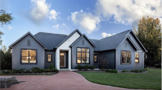 view of front of home with a front yard